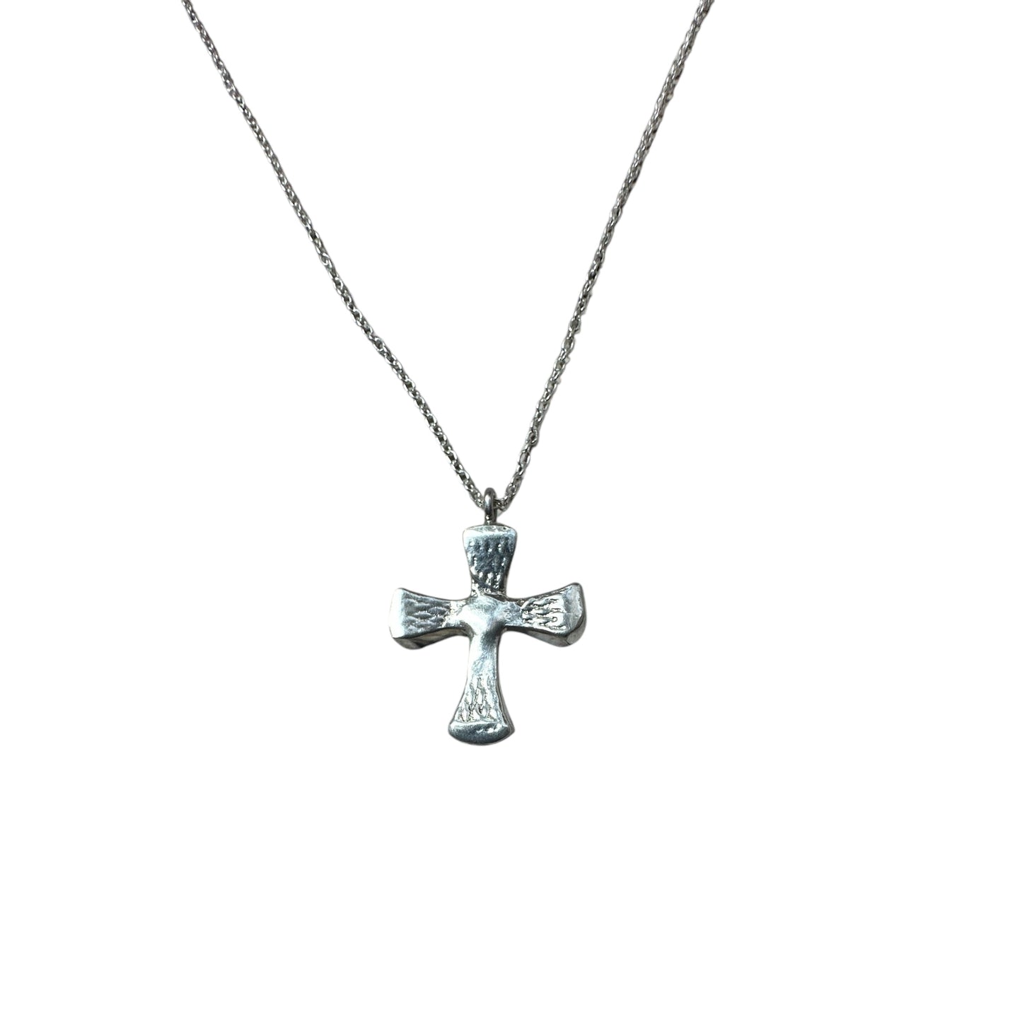 A sterling silver cross pendant with a chain, made from sandcast horseshoe nails
