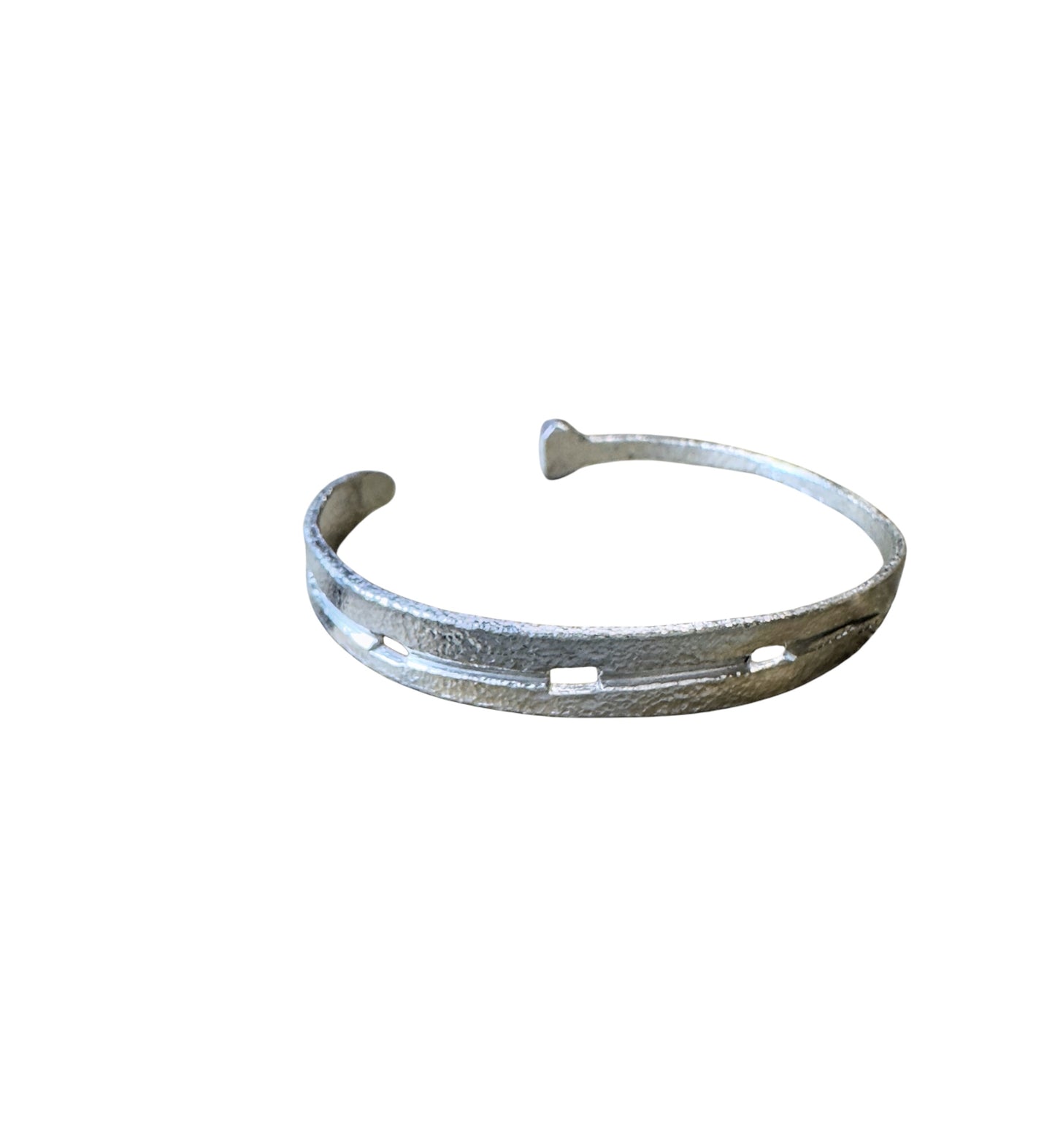 Sterling silver horseshoe nail cuff bracelet. A hand forged silver horseshoe, featuring a cast silver horseshoe nail molded from a real used nail.